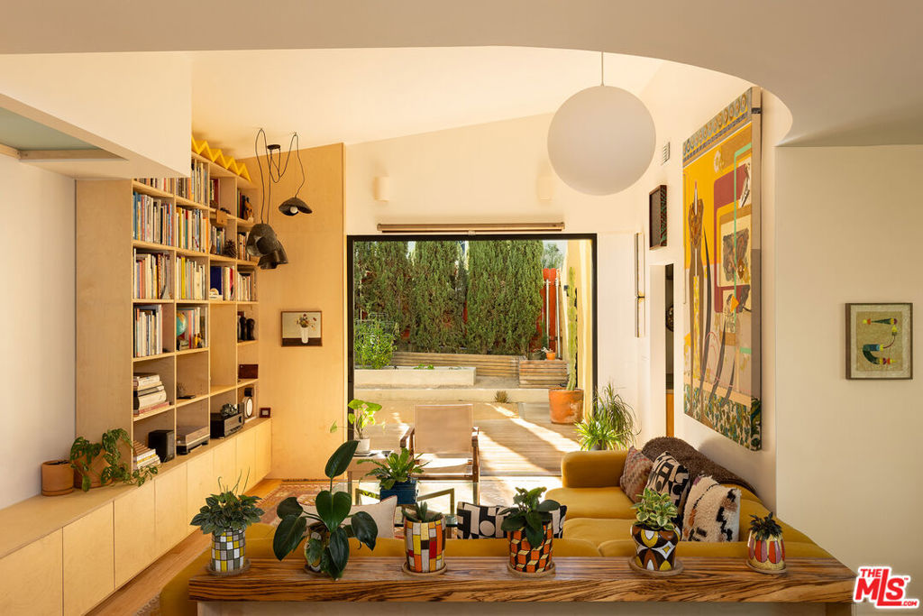 For Lease: Fully furnished, aesthetically-driven home in North East Los Angeles. Introducing The Fold House, a beautifully reimagined residence by architect Ben Warwas in Glassell Park, featuring an ADU/art studio that exemplifies modern design. This handcrafted property includes two bedrooms, two bathrooms, and a loft space. The interior features custom milled built-in cabinetry with distinct Jonas Wood wallpaper, complemented by Fleetwood door systems that add a touch of refinement. Located on a corner lot, this home enhances both the living area and the garage/studio, creating a seamless connection between the house and the yard. The newly designed facade transforms the backyard into a tranquil retreat, completely shielded from street view, providing a private oasis for inspiration and relaxation. Experience in a remarkable shift from traditional home design to a contemporary living environment that emphasizes both style and functionality. See why you'll be proud to call the Fold House home.