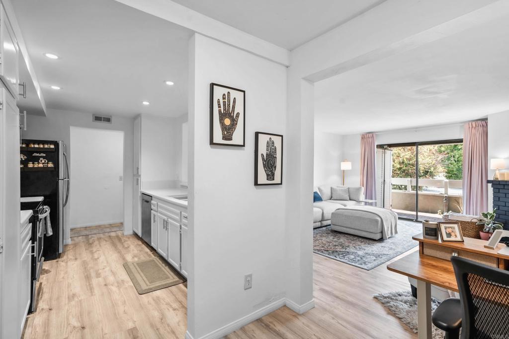 This beautifully maintained 1-bedroom, 1-bath unit is tucked away in a peaceful, gated community in Escondido. The building itself also features secure gate access and an elevator for convenience. Inside, you’ll find an open-concept layout filled with natural light, newer flooring, a cozy fireplace, and thoughtful touches throughout. The modern, bright kitchen includes an Aquasana water filtration system, plenty of cabinet space, and a clean, functional design. Additional highlights include in-unit laundry, two assigned parking spaces, and access to the community pool and spa. Water is included in the HOA! Don’t miss the opportunity to own this charming, move-in-ready home.