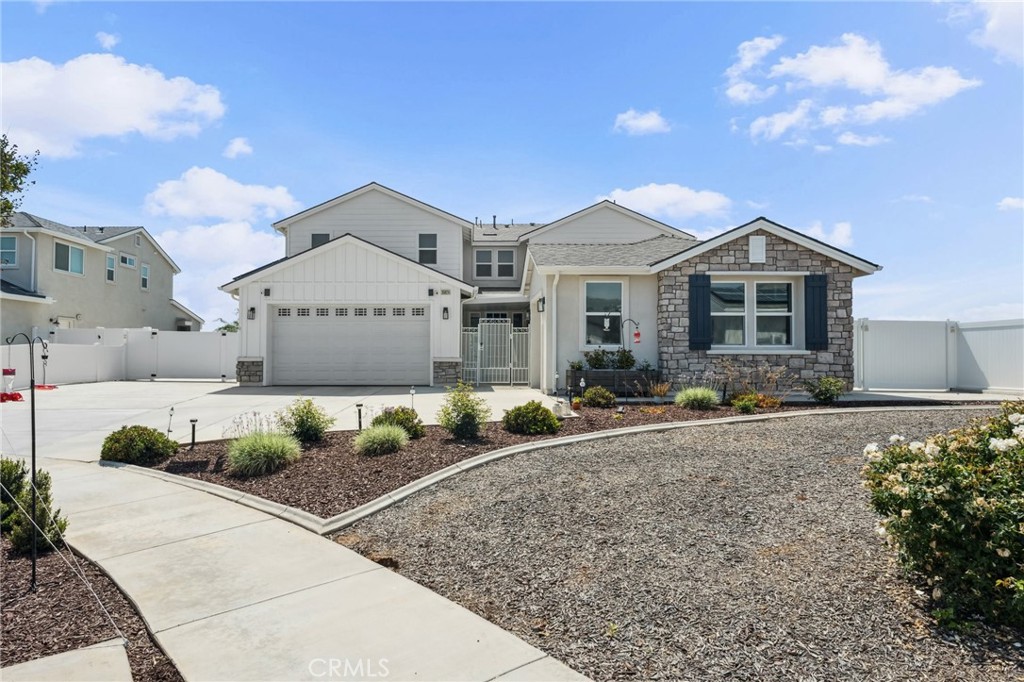 Welcome to your private retreat that sits on the end of a quiet Cul-de-Sac! NO HOA, gated RV parking complete with hookups, and OWNED SOLAR! Boasting with 4 spacious bedrooms and 4 luxurious bathrooms, this home is perfect for growing families, multi-generational living, or anyone craving extra space. Imagine welcoming guests or family into the private main-floor guest suite, a true retreat with its own entrance and bathroom, ideal for in-laws or long-term guest. The kitchen is every chef's dream! Including a central island, the kitchen has plenty of counterspace, soft closing cabinetry, high end appliances, walk in pantry. An adjacent office nook offers the perfect spot for remote work, homework, or managing household tasks, all while staying connected to the welcoming open living room centered around a charming fireplace with laminate wood floors with large windows that fill the space with natural light, creating an inviting ambiance for every season. Upstairs, retreat to your private oasis in the expansive primary suite. The room is finished with carpeting that elevated the sense of comfort, abundant natural light, and a spa-inspired primary bathroom featuring a soaking tub, a large step-in shower with a seating bench, dual vanities, and an oversized walk-in closet that will satisfy the most discerning fashion lover. Two additional large bedrooms, each with walk-in closets, share a beautifully appointed full bath with double sinks, perfect for kids, guests, or a growing household. Laundry day becomes a breeze with a generously sized upstairs laundry room complete with a handy utility sink. Transition effortlessly to the outdoor space, designed for effortless entertaining and relaxation. Enjoy warm evenings under the covered patio with ceiling fans, gather around the built-in fireplace, or unwind in the low-maintenance beautifully paved yard. The gated concrete RV parking with hookups means adventure is always within reach. This is more than a house, it’s a lifestyle. Whether you’re hosting gatherings, enjoying quiet moments by the fireplace, or parking your RV for a weekend getaway, this home meets your every need with elegance and ease. Additionally, this home includes an electric car charger, electric window shutters, recessed lighting, ceiling fans throughout the home. Don’t miss your chance to claim this rare gem. Schedule your private tour today and experience the perfect blend of luxury, space, and smart living!