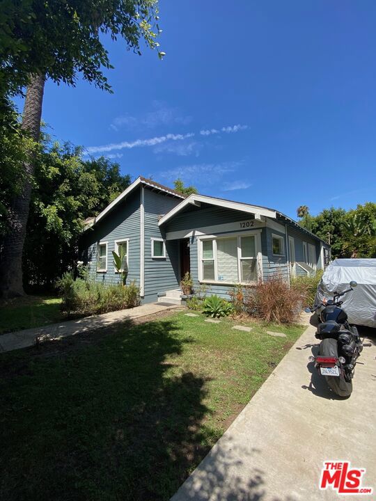 Available for rent for 1-6 months 9/1/25-2/28/26. Beautiful gated, fenced and fully furnished 3 bedroom, 2 bathroom single family home with private, large grassy yard on a quiet, tree lined street in one of the most desirable locations in West Hollywood. Features: utilities included (up to $400 per month), wifi included, hardwood floors, spacious open floor plan, updated bathrooms including the primary bathroom with Japanese toilet and steam shower, walk in closet with skylight in primary, updated kitchen with refrigerator, dishwasher, wine refrigerator and washer/dryer. Primary bedroom has private ensuite bathroom. Second bathroom is an ensuite in guest bedroom. Owner will pay $300 per month for electricity and $100 per month for gas. Tenant will pay any amount in excess. Walk to everything. 1 block to Trader Joes and several popular restaurants and bars and just a few blocks to art galleries, Target, Best Buy, Sprouts, Ralphs and several other dining options and retail shops. Also ideal for commuters with easy major artery, highway and public transportation access. Pets allowed.