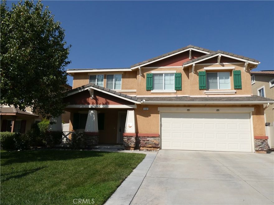 It's a beautiful home nestled in a quiet, well-established neighborhood of Redlands. This spacious residence features an open floor plan with abundant natural light throughout. The large kitchen with a center island,  walk-in pantry, and a plenty of cabinets — perfect for gatherings and meal prep. The inviting family room, complete with a cozy fireplace, creates a warm and comfortable atmosphere. The generous master suite boasts a walk-in closet and an en-suite bathroom with dual sinks. Upstairs, a huge loft offers endless possibilities — ideal for a home office, entertainment space, or a playroom. Additional highlights include a custom shutters and ceiling fan/ light, an indoor laundry room and  a covered patio and spa ready for outdoor relaxation or entertaining. Conveniently located near shopping, dining, schools, and parks, this home truly has it all. Don’t miss your chance to see it — schedule a tour today!
