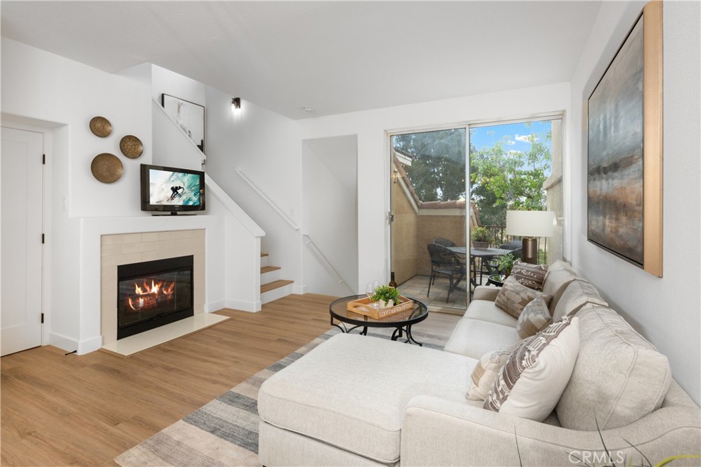 Welcome to your new favorite spot in the Monaco community of Anaheim Hills—a place so perfect you might start calling it home before you even move in! Let me give you the scoop on this totally revamped gem: Location: Nestled in the coveted Monaco community, this home offers a front-row seat to the best that Anaheim Hills has to offer. Imagine living where the only thing more picturesque than the canyon views is the local neighborhood gossip. Interior Upgrades: Flooring: Slip into luxury with brand new wood-tone vinyl flooring that’s so stylish it might just make your old rugs jealous. Kitchen: Channel your inner gourmet chef with sparkling Quartz countertops, shiny stainless steel appliances, a subway tile backsplash, and white shaker cabinets. It's so upgraded, even your microwave will feel fancy. Living Room: This space is ready for your next Netflix binge with a custom-designed fireplace and sliding glass doors that open to a private patio with breathtaking canyon and hillside views. The only thing missing is a popcorn machine! Bathrooms: Both bathrooms have been given a facelift with new Quartz countertops, white shaker cabinets, and fixtures that scream modern luxury. Primary Bedroom: Wake up to stunning floor-to-ceiling views in your secluded primary bedroom. The remodeled master bathroom is like a spa day every day, complete with a dual vanity and a walk-in closet that’s practically begging for a shopping spree. Garage: The oversized two-car tandem garage is equipped with epoxy flooring and a laundry area. Perfect for parking your car, your hobby collection, or even your future indoor mini-golf setup. Community Amenities: Dive into fun with a resort-style pool, three spas, BBQ areas, a clubhouse, tennis courts, and a gym. It's like having a vacation resort in your backyard, minus the need for sunscreen. Location Convenience: You're conveniently close to major freeways, hiking trails, restaurants, and shopping. Everything you need is just a hop, skip, and a jump away. If you have any questions or just want to chat about how awesome this place is, don't hesitate to reach out. For more juicy details, take a peek at the Monaco community in Anaheim Hills. You won’t be disappointed!