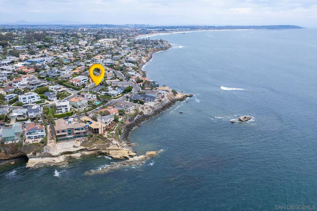 Situated near the ocean on the quieter west-side of Bird Rock, this delightful beach cottage is just steps to the water. You’ll enjoy Pacific sunsets and the sound of breaking waves from your own home. And just two blocks inland you can walk to the best of Bird Rock restaurants, coffee shops, boutiques and great schools. Ideally suitable as a primary or secondary home or investment property in a super location. Architectural plans submitted to the City of San Diego for expansion of the home to include master bedroom with bathroom ensuite and walk-in closet. Architectural renderings for ocean and sunset viewing roof deck available. CC&R’s limit height to one-story residence. Easy to show: For further information, text or call Nick at 858-354-8772