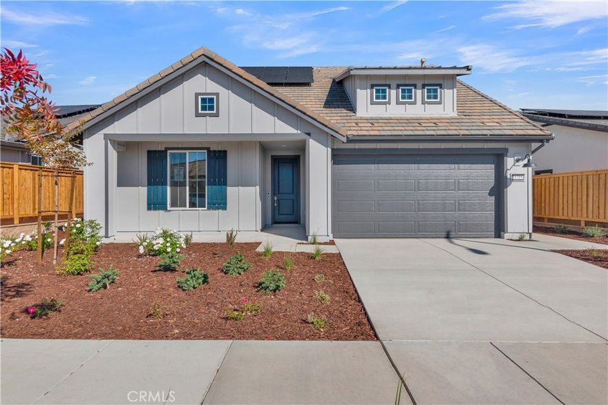 Experience modern elegance and effortless comfort in a Nevina Connect II floorplan, nestled in the heart of Paso Robles wine country. This stunning home showcases a gourmet kitchen with upgraded quartz countertops, a designer tile backsplash, premium KitchenAid® stainless steel appliances, and sophisticated smoked gray stained cabinetry. The open-concept great room features a dramatic rolling wall of glass that opens to a covered patio with gas BBQ stub and a fully landscaped backyard, creating a seamless indoor-outdoor flow ideal for entertaining or quiet relaxation. Inside, a striking fireplace with precast surround adds warmth and architectural character to the living space.

The private primary suite offers a true retreat, complete with tall windows that bathe the room in natural light and a spa-inspired bath featuring upgraded quartz counters, a tiled shower with frameless glass, and Shea Shower. Designer touches are found throughout, including luxury vinyl plank flooring in main living areas and bedrooms, upgraded tile baths, two-tone interior paint, and 5½" baseboards. With an expanded laundry room featuring upper and lower cabinetry and sink, brushed nickel accents, and LED lighting, this move-in ready home exemplifies comfort, craftsmanship, and style.

Nevina™—a Trilogy® Boutique Community™, you’ll find more than a home—you’ll discover a way of life. Enjoy access, with additional membership, to a resort-caliber clubhouse, social and wellness amenities, and the best of Paso Robles living—world-class wineries, renowned dining, and a vibrant, welcoming community that captures the essence of California’s Central Coast.