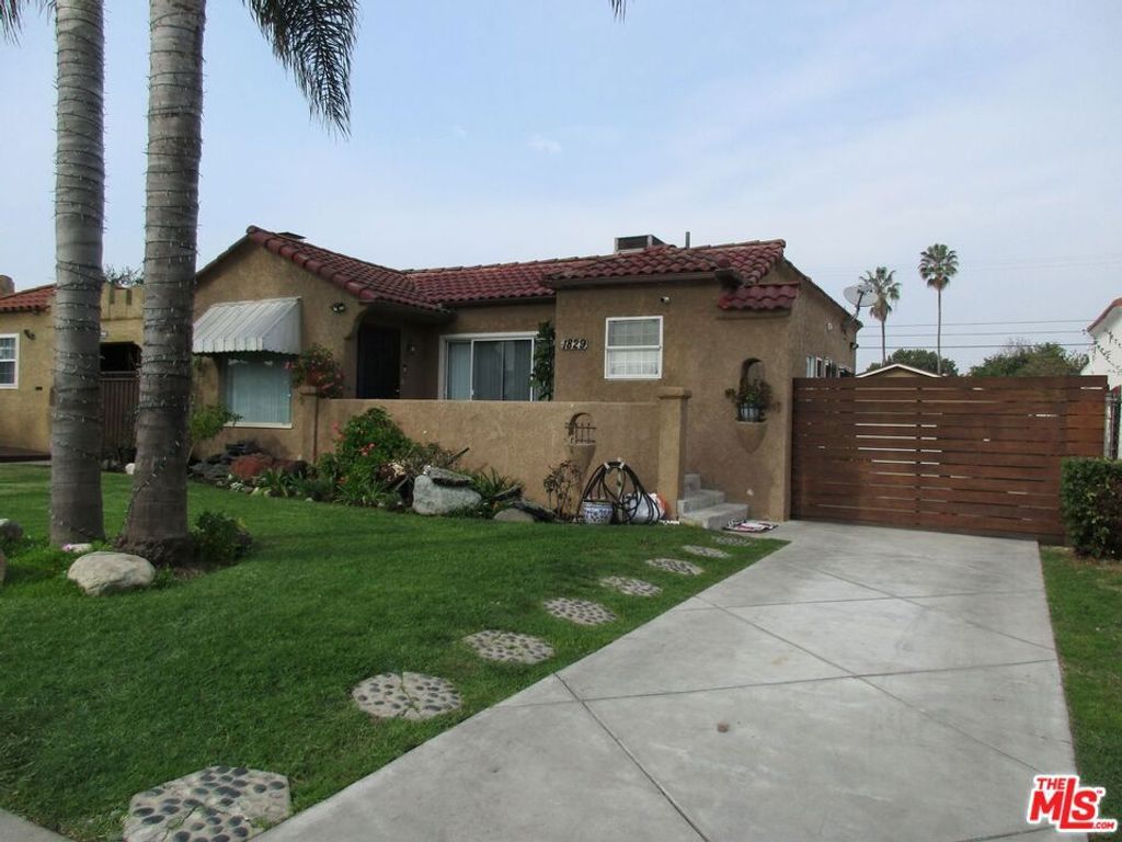 Photo of 1829 W 84th Place, Los Angeles, CA 90047 (MLS # 26643367)
