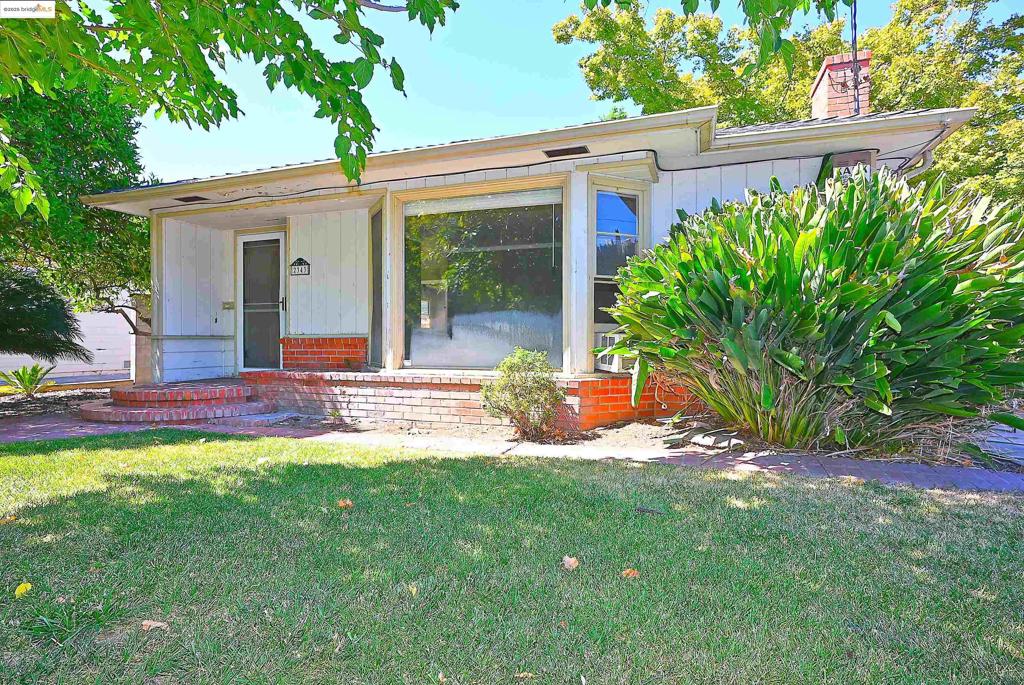 Show anytime. Vacant. Open house Sunday 9/14, 2 to 4 pm. 3 bedroom, 1.5 bath traditional bungalow with brick fireplace, with some hardwood floors, located steps from the John Muir Medical Center, Mount Diablo High School. Close to parks, transportation, shopping etc. Lot is 7150 sq ft with a long driveway for at least 4 off street parking spots, 135 sq ft finished shed, perfect for home office, art room, exercise room, etc. and a 2 car garage. Covered patio with BBQ. Mature vegetation. Cosmetic fixer. Needs some TLC. Potential galore. Offers due Wed Sept 17, 3:30 pm