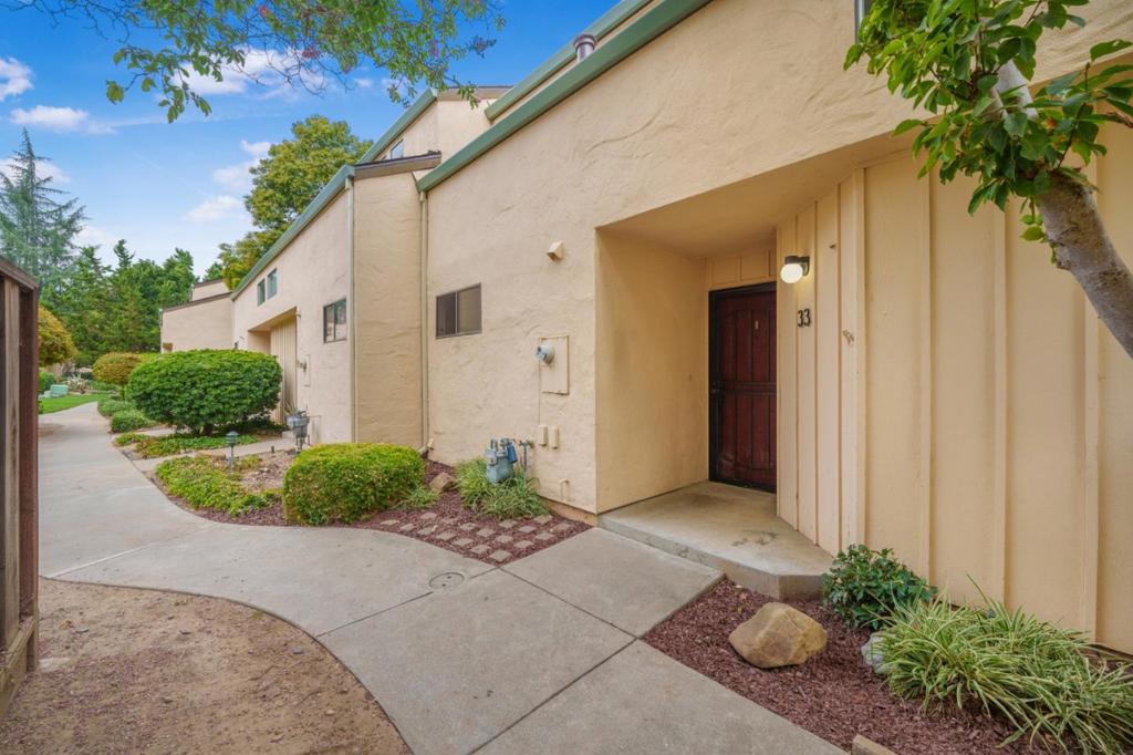 Welcome to 8105 Kern Avenue, Unit 33, in Gilroy! This charming 2-bedroom, 1.5-bath townhome-style condo offers 1,209 sq. ft. of comfortable living space in a secure gated community. Step inside to find a bright and open floor plan with a spacious living area, a functional kitchen, and a dining space ideal for gatherings. Upstairs, both bedrooms provide privacy and comfort, including a generously sized primary with ample closet space. Enjoy the convenience of an attached garage, in-unit laundry, and private patio space perfect for relaxing or entertaining. The community offers peace of mind with gated entry while being close to shopping, dining, parks, schools, and easy commuter access. Dont miss this wonderful opportunity to own in one of Gilroys desirable gated neighborhoods!