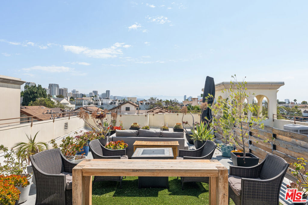At the heart of this West LA penthouse is a rare luxury: a private, 800-square-foot rooftop deck accessible only to this unit perfect for lounging, entertaining, or simply enjoying the nearly 360-degree city views. Whether it's sunrise coffee or evening cocktails under the stars, this expansive outdoor space offers a true extension of your living area.Inside, enjoy exceptional privacy with no shared walls and windows and doors on all sides that lead to a wrap-around balcony, filling the home with natural light and fresh air throughout the day.The newly updated kitchen features crisp white cabinetry, gleaming stainless steel appliances, and a layout designed for both function and style. Two generously sized bedrooms provide comfort and retreat, including a serene primary suite with a spa-like ensuite bath and soaking tub.High ceilings amplify the sense of space, and an in-unit washer/dryer adds everyday convenience. Additional highlights include two assigned parking spaces and a private storage room, offering plenty of room for your gear and belongings.All this just minutes from Brentwood, Century City, Westwood Village and UCLA private, polished, and perfectly located on LA's desirable Westside.