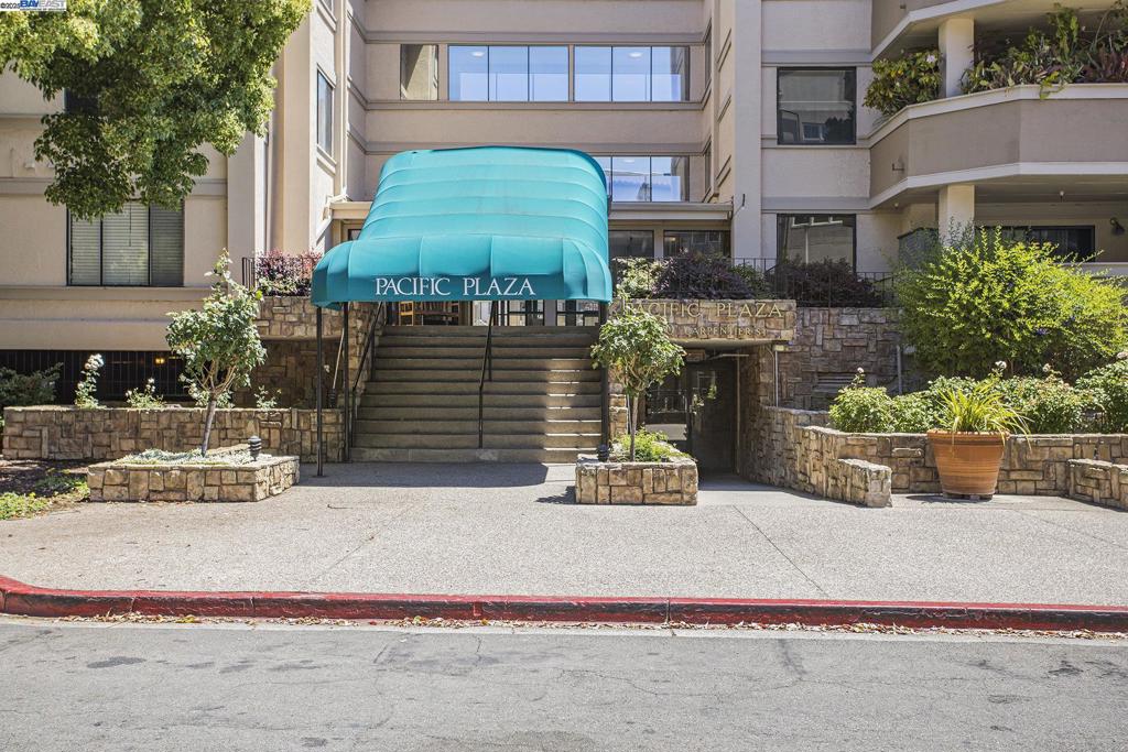 Don’t miss this fantastic opportunity to own a spacious second-floor corner unit at an unbeatable price — ready for you to update and make it your own! This 2-bedroom, 2-bathroom condo offers 1,406 sq. ft. of comfortable living space filled with great natural light. The generous primary suite includes double vanities, a soaking tub, and a separate shower, while the hall bathroom features a shower-over-tub combo. Enjoy the convenience of in-unit laundry with a stackable washer and dryer, as well as gated, assigned garage parking with elevator access to your floor. Located just one block from BART and two blocks from the vibrant downtown, with easy access to both Highway 880 and 580, this home offers the perfect blend of space, value, and location. Bring your vision and transform this condo into your ideal home!