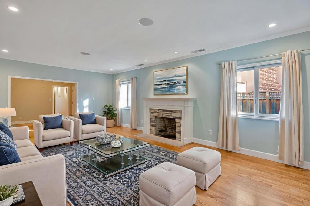 Expansive 3 bedroom, 3 bath 2,010 square foot home on a level 6,750 square foot lot in desirable westside San Mateo. Step through the front door into a large living room wrapped in crown molding, capped with recessed lighting adjacent to a spacious dining room. In the updated kitchen discover stainless steel appliances, custom cabinetry, granite countertops and a striking hand made tile backsplash. A combination dining and family room off the kitchen is finished with travertine tile, creating a warm and inviting space for gatherings. The spacious primary suite is a true retreat, offering a luxurious updated bath with marble accents, oversized soaking tub, and separate shower stall. Two additional bedrooms provide flexibility for family, guests, or home office needs. Hardwood floors, crown molding, dual paned windows and recessed lighting throughout. Outside is a stylish backyard featuring drought-tolerant desert-inspired plants and artfully arranged landscaping. Walking distance to schools, the shops, and restaurants along 25th Avenue, Beresford Park, the Hillsdale Mall, and public transportation. Minutes to Highways 92, 280, 101 and SFO. Worth a viewing!