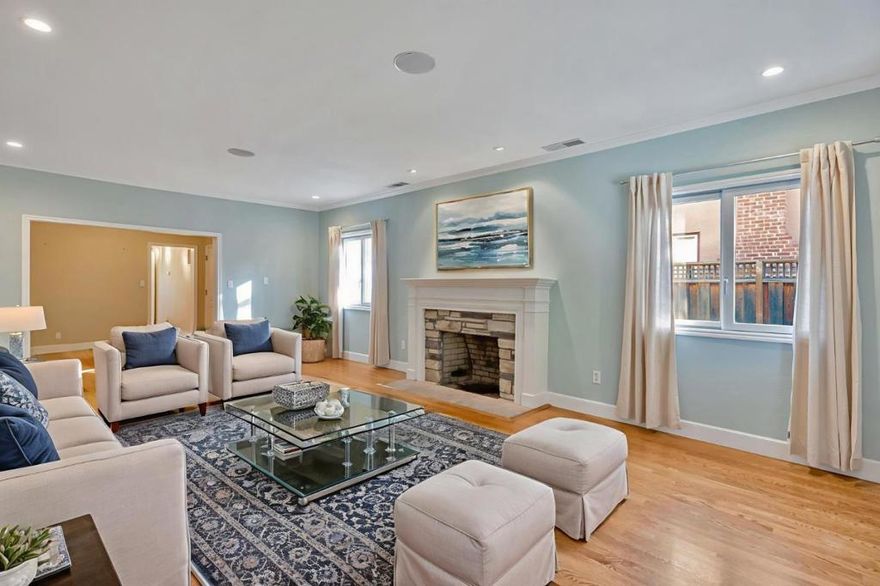Expansive 3 bedroom, 3 bath 2,010 square foot home on a level 6,750 square foot lot in desirable westside San Mateo.  Step through the front door into a large living room wrapped in crown molding, capped with recessed lighting adjacent  to a spacious dining room. In the updated kitchen discover stainless steel appliances, custom cabinetry, granite  countertops and a striking hand made tile backsplash. A combination dining and family room off the kitchen is  finished with travertine tile, creating a warm and inviting space for gatherings. The spacious primary suite is a  true retreat, offering a luxurious updated bath with marble accents, oversized soaking tub, and separate shower stall.  Two additional bedrooms provide flexibility for family, guests, or home office needs. Hardwood floors, crown molding,  dual paned windows and recessed lighting throughout. Outside is a stylish backyard featuring drought-tolerant  desert-inspired plants and artfully arranged landscaping. Walking distance to schools, the shops, and restaurants  along 25th Avenue, Beresford Park, the Hillsdale Mall, and public transportation. Minutes to Highways 92, 280, 101 and SFO.  Worth a viewing!