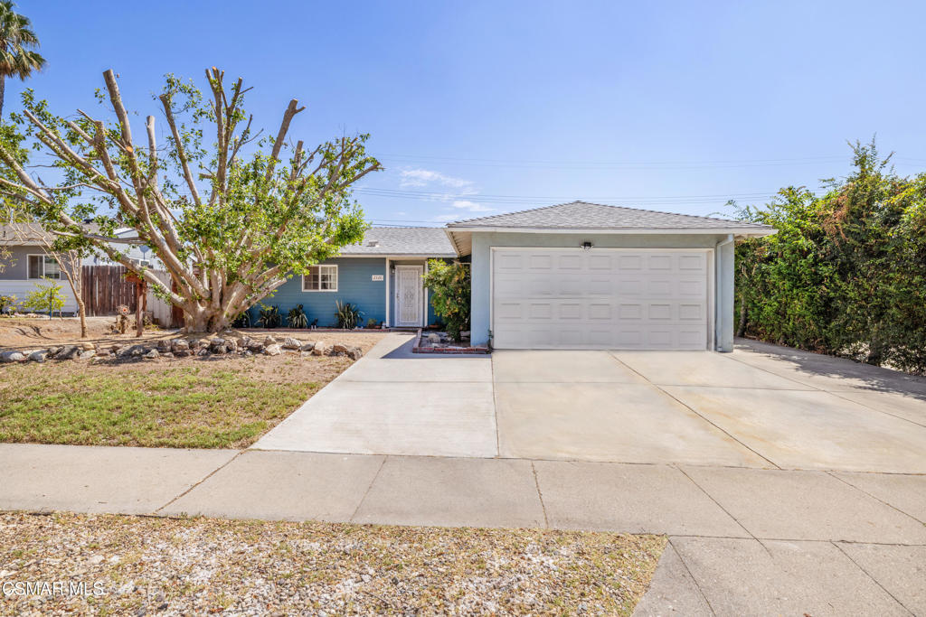 Tucked in the heart of Simi Valley, this single-story home welcomes you with charm and comfort. Featuring three bedrooms and two bathrooms on a generous 6,500+ sq ft lot, it offers the perfect blend of convenience and potential.Inside, you'll find new vinyl flooring, dual-paned windows, and thoughtful touches like ceiling fans in the living area and two of the bedrooms. The primary suite includes its own private en suite bathroom, while the additional bedrooms provide flexibility for guests, work, or hobbies. An indoor laundry room with ample storage and a convenient side door, along with an attached two-car garage, makes daily living a breeze. The expanded driveway also offers extra parking for guests or additional vehicles. Additional updgrades include a tankless water heater, copper plumbing and smooth ceilings throughout the living areas and bedrooms. Step outside and find your covered patio, ready for outdoor dining or relaxing, while the open space beyond awaits your vision for a dream garden, play area, or entertaining retreat.This charming home combines warmth and practicality in a central location--just minutes from Trader Joe's, Target, and a variety of shopping and dining options.With its thoughtful updates, versatile layout, and central location, this Simi Valley charmer is ready to be the place you call home.