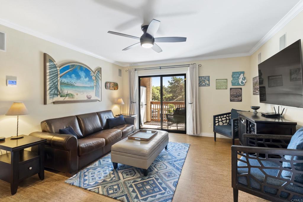 Welcome home to 12007 Alta Carmel Ct, Unit 325. Your exquisitely and beautifully updated 1-bedroom/1-bath oasis offers 704 sq. ft. of comfort and style in one of Carmel Valley’s most sought-after communities. Pride of ownership is immediately evident as you step inside and notice the custom cork laminate flooring, crown molding, recessed lighting and built in speakers that set a warm, inviting tone. Open living space is complemented by newer double-pane windows and sliding patio door and a new HVAC system (installed in 2024) for year-round comfort. Your kitchen is a dream with granite counter tops, whisper-close cabinets, stainless steel appliances including refrigerator, range and dishwasher. Step further into the walk-in pantry-blending style with everyday convenience. Finally, the elegant and highly efficient washer and dryer are included with the home. The spacious bedroom includes custom planation shutters and matching closet doors, while the fully remodeled bathroom showcases a Tuscan-inspired shower that feels like a spa retreat. Beautiful ceiling fans and thoughtful finishes throughout add both charm and functionality. Beyond the home itself, residents enjoy resort-style amenities including a heated pool, tennis and basketball court, soothing jacuzzi, barbecue area, gym, and a recently renovated sauna- perfect for both relaxation and entertainment. Located in the heart of Carmel Valley, this condo offers easy access to top-rated schools, scenic parks, shopping, dining, and just a short drive to San Diego’s world-famous beaches. Whether you’re a first-time buyer, downsizing, or looking for a fantastic investment, your home combines modern upgrades with a lifestyle that’s hard to beat. Come experience it for yourself -this Carmel Valley gem won’t last long!