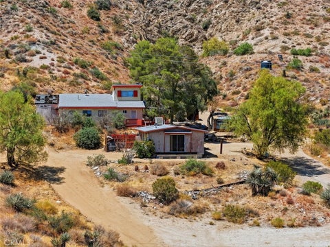 Photo of 49324 Whiteside DR, Morongo Valley, CA 92256 (MLS # JT26116151)