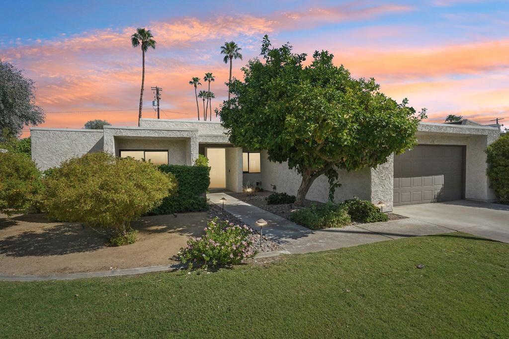 Step into timeless desert elegance with this exceptional residence, part of an intimate enclave of just 28 private, detached homes designed by legendary mid-century modern architect Donald Wexler. Rarely available, these homes showcase the iconic design elements that have made Wexler a celebrated name in Palm Springs architecture, thoughtfully updated here with modern finishes for today's lifestyle. Inside, you'll find a spacious 3-bedroom, 3-bath layout highlighted by terrazzo-inspired flooring, abundant storage, and two new Carrier A/C systems for year-round comfort. The fully remodeled, mid-century inspired kitchen features stainless steel appliances, sleek cabinetry, and clean lines that perfectly honor the home's architectural heritage. An attached indoor laundry room, oversized closets, and a 2-car attached garage add convenience and functionality. The primary suite is a private sanctuary with a walk-in closet, dual vanities, a soaking tub, and a separate shower. Expansive glass doors invite natural light and frame views of your own private backyard that is awaiting your personal touch. Beyond your retreat, enjoy resort-style amenities including a sparkling community pool and tennis courts, all nestled within lush landscaping. Perfectly situated near the prestigious Tamarisk neighborhood of Rancho Mirage, this home places you close to world-class golf, fine dining, shopping, and cultural attractions while still offering privacy and serenity. This rare combination of architectural pedigree, modern upgrades, and an enviable location makes this home a true desert treasure. *Property is listed as a a Single Family Residence, however property records clasify as a Condominium. HOA dues are $650 per month, includes community ammenities, cable and internet. This is lease land with a fee of $5300 per year, lease goes to year 2067.