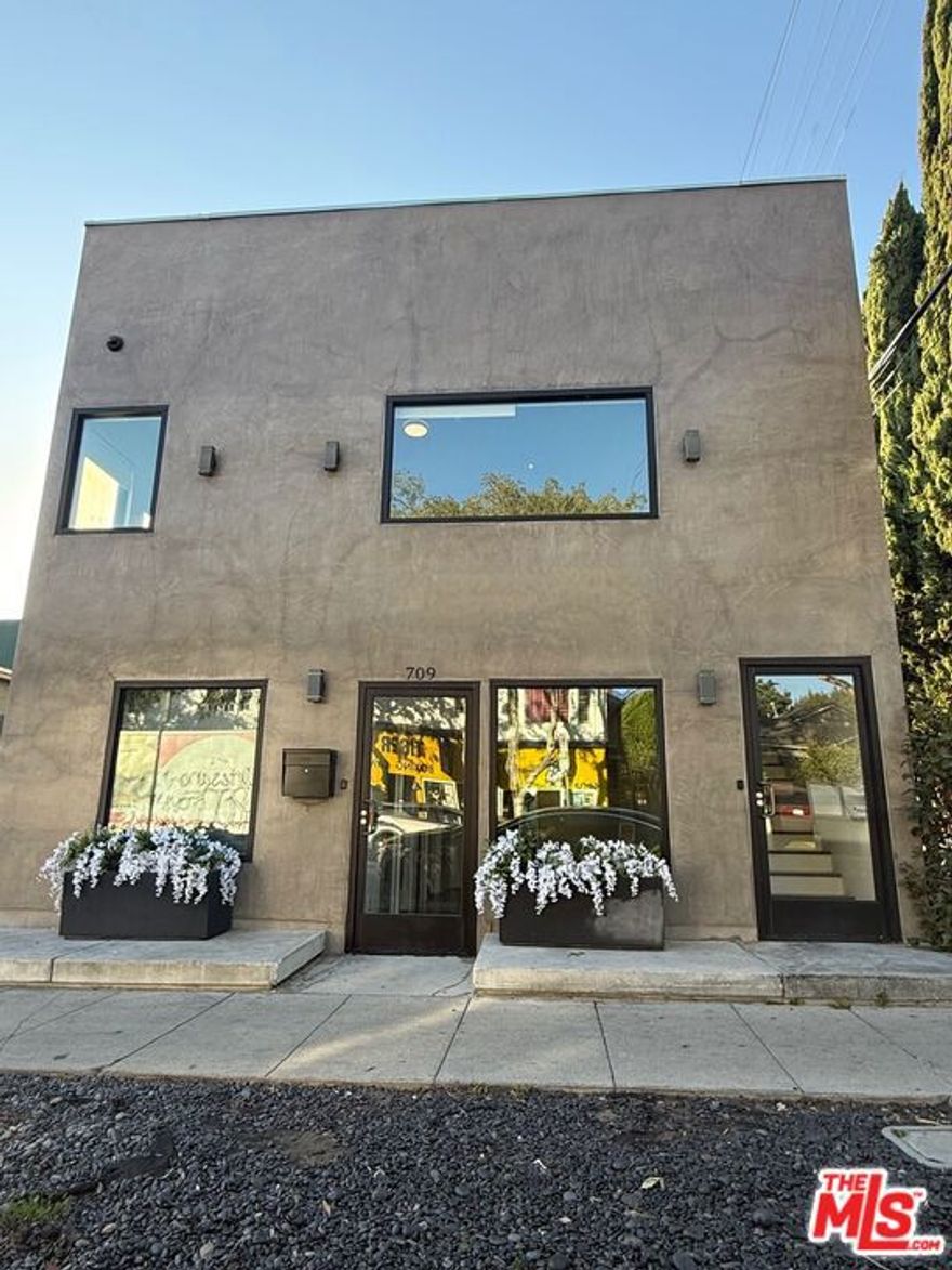 709 North Gardner Street is a rare free-standing owner/user, office/live work,  creative space for entertainers, excellent for a show room, hair dressers, tattoo parlors, flex space, art gallery, retail space and much much more..  located in Los Angeles' Fairfax neighborhood, just north of Melrose Avenue between North La Brea Avenue and Fairfax Avenue, a location surrounded by businesses within the entertainment industry and just minutes from West Hollywood. The subject property features a two-story 2,832 SF building parking available nearby (current owner leases spaces from the CVS across the street). The top floor consists of one large office including a shower and bath, two private offices, one conference room and a creative open space. The downstairs portion of the building consists of four private offices, a kitchen, a bathroom and additional storage space. 709 North Gardner Street is in close proximity to multiple Los Angeles retail landmarks such as The Grove and Pink's Hot Dogs, and just down the street from prominent entertainment destinations such as the Hollywood Improv and the Groundlings Theatre; walking distance to a plethora of restaurants such as Cobras & Matadors, Melrose Umbrella Co, and Nomoo, among others. Rare opportunity to purchase a free-standing office building; the space is fully built-out and nicely maintained.  This is a must see!!  Very easy to show..