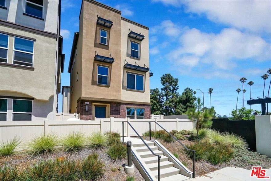 Welcome to Grace Park, a newly constructed gated community located in the heart of Inglewood and located and  just 5 miles away from Los Angeles International Airport (LAX) with easy access to major freeways, SoFi Stadium and The L. A. Forum and the new Intuit arena.  Also  a short drive to Playa Del Rey and Venice Beach. Easy to show and available for immediate move in. This freestanding home is an end unit with great privacy and morning sun offering 3 oversized bedrooms, 2 EnSite upstairs and one EnSite downstairs. With an attached 2 car private garage allowing direct access plus ample guest parking. Enjoy the enclosed patio off the front yard. The kitchen offers new high grade kitchen appliances, center island with bar seating and pantry. The generous living space has space for a home office and offers a half bath for guest. The home offers central AC/heating, inside washer and dryer located on the top floor, Nest system and more!