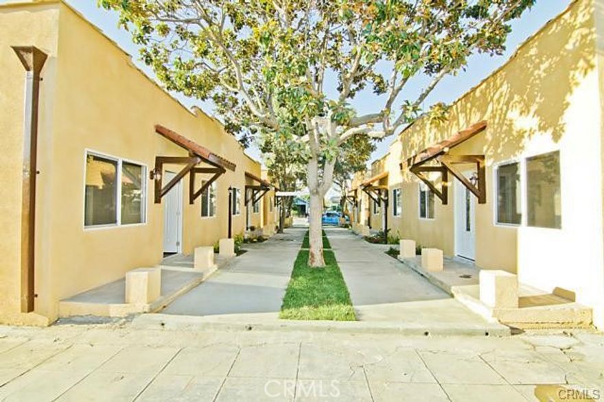 Discover a serene retreat in these beautifully remodeled courtyard bungalows in a garden-style setting. Each unit features a modern kitchen with granite countertops, updated bathrooms, durable laminate wood flooring, and energy-efficient dual-pane vinyl windows. These homes are enhanced with newer electrical systems and blend timeless charm with contemporary convenience. Don't miss the chance to experience this oasis in person and see for yourself!