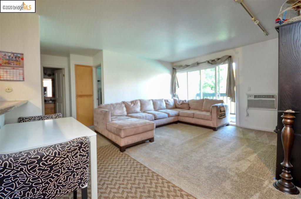 Immaculate 2 bedroom 2 full bath condo located in Livermore. Secure 2nd story unit with views of the pool, gated parking, and nice lobby. This unit also features a bonus space that can be used as a formal dining room, an office, or toy room.
