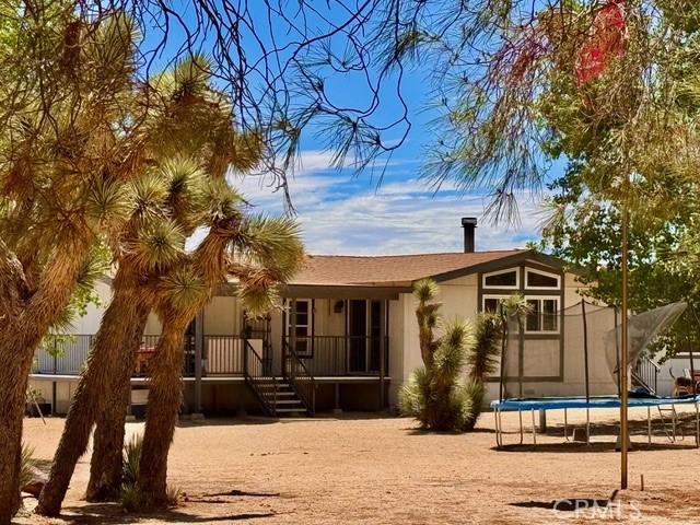 Nestled on a spacious 2.09-acre parcel, this 1984-built manufactured home offers an inviting blend of open-plan comfort and serene desert living. With 4 bedrooms and 3 full bathrooms across approximately 2,220 sqft of living space, the home features a warm and functional layout. A detached single-car garage and ample parking add convenience, while the property’s unobstructed territorial mountain views provide a peaceful, natural backdrop
Inside, enjoy a light-filled floor plan with comfortable living areas and plenty of room for family or guests. The single-story design blends indoor and outdoor living with ease. Surrounded by the rolling desert landscape of Phelan, the property offers both space and privacy—perfect for those seeking open-land living without sacrificing accessibility to local amenities
Ideal for first-time buyers or those looking to downsize, this off-market home combines affordability, size, and potential in California’s high desert. Don’t miss the opportunity to transform this light-filled retreat into your very own desert oasis.