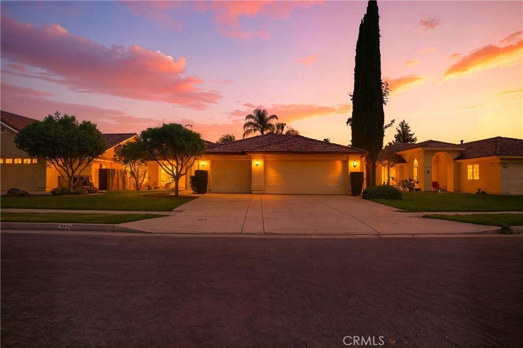 Welcome to this stunning home in one of Madera’s most desirable neighborhoods! From the moment you step inside, you’ll feel the warmth and charm this home offers. The rich-colored floors set a welcoming tone, while the versatile home theater can easily double as an additional bedroom or flex space.
The open kitchen features a cozy breakfast nook, bar seating, and a formal dining room, all flowing into the elegant living room with its beautiful coffered ceiling. Two sets of French doors open to the backyard, one from the living room and another from the primary suite, creating a seamless indoor-outdoor experience. The spacious primary bedroom boasts vaulted ceilings, a large closet, a walk-in shower, soaking tub, and direct backyard access.
Step outside to your own private oasis: a rare pool, lush landscaping, and a backyard designed for both relaxation and entertaining.
Don’t miss this opportunity! Make this beautiful Madera home yours today!