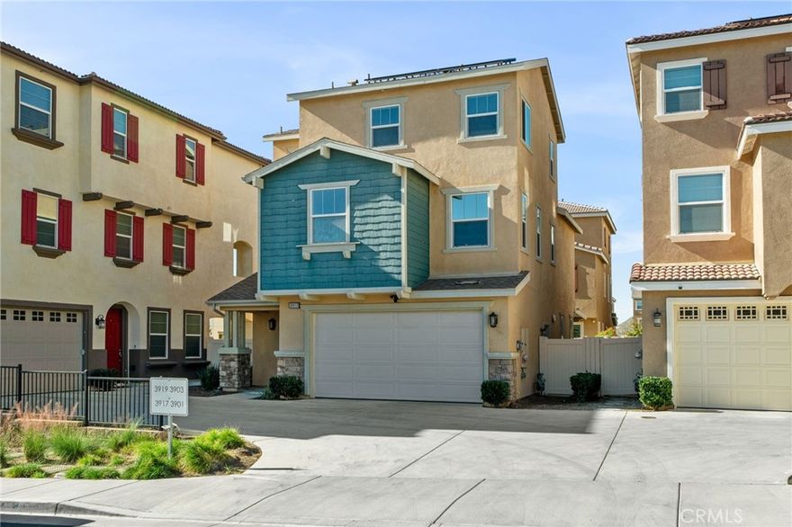 Step into this beautifully designed Jurupa Valley condo, offering a spacious, functional layout perfect for comfortable living. The main floor welcomes you with an open-concept flow featuring a kitchen with a granite peninsula, convenient bar seating, and a pantry for extra storage. The kitchen opens to the cozy family room, complete with built-in media storage, and sits adjacent to a guest-friendly powder bathroom. From the family room, step outside to the newly finished covered patio—a stylish, private outdoor retreat ideal for relaxing or entertaining.

The second floor hosts a thoughtful and well-organized layout with three bedrooms, two bathrooms, and the laundry room. The primary bedroom offers a peaceful escape, paired with a large ensuite bathroom featuring dual sinks and built-in storage. Two additional secondary bedrooms share a full bathroom—also appointed with dual sinks—and this level is completed by the conveniently located laundry room.

On the third floor, you’ll find a versatile loft area along with a fourth bedroom and an additional full bathroom—perfect for guests, multigenerational living, or anyone seeking added privacy.

Additional highlights include paid-off solar for energy efficiency and long-term savings. The gated community also features a children’s playground. With its smart tri-level design, updated outdoor space, and generous room count, this condo provides exceptional comfort, flexibility, and value in a great Jurupa Valley location.