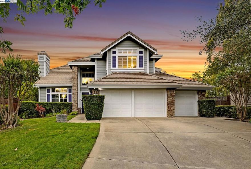 Discover timeless elegance in Pleasanton’s exclusive gated Ruby Hill community! This exquisite home effortlessly blends sophistication and comfort with a huge gourmet kitchen featuring stainless steel appliances, a large center island, and a bright dining nook that bathes the kitchen and family room in tons of natural light. A formal dining room provides the perfect setting for hosting elegant gatherings, while a downstairs bed & full bath retreat offers flexible space for guests or a private office. The 3-car garage ensures ample storage and convenience.  Nestled on an massive 15,194 sq ft court lot, the beautifully landscaped yard is a true standout, offering multiple patios, a sport court, lush lawns, and raised garden beds. With abundant space for a future ADU or pool, the possibilities for outdoor luxury are endless.  Ruby Hill residents enjoy world-class amenities, including a pool, clubhouse, tennis and basketball courts, and outdoor gathering spaces. Conveniently located near downtown Pleasanton, Livermore Valley wine country, outdoor recreation, and with easy Hwy 84 access, this home delivers an unmatched lifestyle combining elegance, recreation, and convenience.