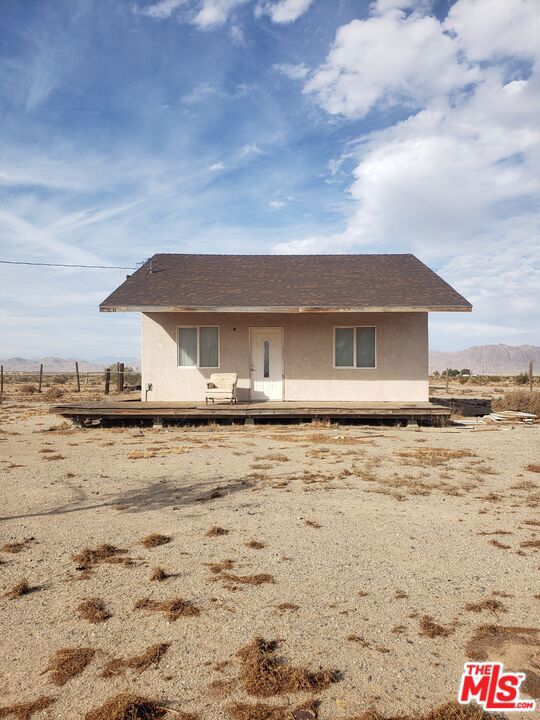 5 Acre property in Rural area of Lucerne Valley with a single family house on the property and a manufactured home. Property in need of tlc/repairs. Seller open to seller financing with a down payment or open to creative financing. Last 5-10 minutes to property is a dirt road. Use GPS to get you to the property.