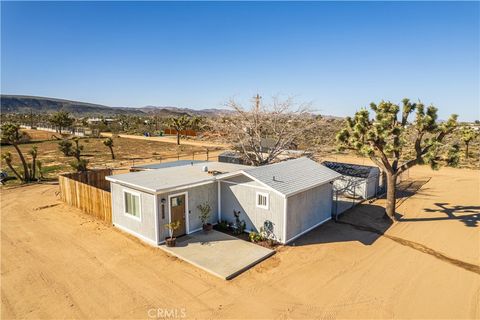 Photo of 3220 Sage Ave, Yucca Valley, CA 92284 (MLS # JT26027017)