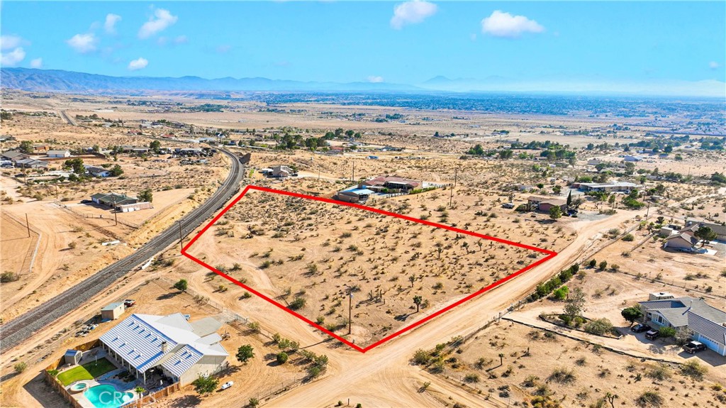 Discover the perfect canvas to build your dream home on this expansive 2.92-acre vacant lot, ideally located in the highly desirable area of Apple Valley. Surrounded by beautiful custom-built homes, this property offers a rare opportunity to create a private desert retreat while still being part of an established and scenic neighborhood.
Enjoy the natural beauty of the High Desert with sweeping views of the mountains, wide-open skies, and stunning sunsets that paint the landscape every evening. This lot offers the ideal blend of seclusion and convenience—nestled just off a paved road for easy access, yet far enough to enjoy the peaceful tranquility of desert living.
Whether you're looking to build your forever home or invest in one of Apple Valley's most sought-after areas, this property is full of potential. With nearly 3 acres of usable land, there’s plenty of room for a custom home, workshop, guest house, and more.
Don’t miss out on this unique opportunity to own a piece of California’s beautiful High Desert. Come see the possibilities for yourself!