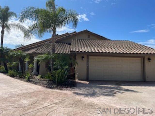 Welcome to a spacious and well-appointed home located in one of east county’s most desirable neighborhoods. This property features 5 bedrooms and 4 bathrooms, offering flexible living arrangements for families or those who love to host. There is ample parking available, including space for an RV and other recreational vehicles. Enjoy outdoor living with an infinity pool and spa, built-in BBQ, and mature fruit trees. The home is also equipped with solar panels for energy efficiency. The primary suite offers a relaxing retreat with a jetted tub, a large shower, dual sinks, a separate vanity, and a walk-in closet with built-in organizers. Downstairs, you’ll find two additional bedrooms and two bathrooms, one with direct pool access—ideal for guests and entertaining. The kitchen is designed for functionality with Corian countertops, all-wood cabinetry, a cooktop, dual wall ovens, and a spacious pantry with The first floor also features a breakfast nook, a living room with a fireplace, a dining room, a laundry room with hookups and a sink, as well as convenient access to the garage. Upstairs, a versatile loft area is perfect for entertaining or relaxing, complete with a wet bar, sink, built-in microwave, refrigerator, and beautiful mountain views. Two more bedrooms, a separate bathroom, and a utility room with a laundry chute complete the second floor. Discover this spacious, well-maintained home in one of east county’s most sought-after neighborhoods. With 5 bedrooms and 4 bathrooms, the layout offers flexibility for a variety of living needs. The property provides generous par