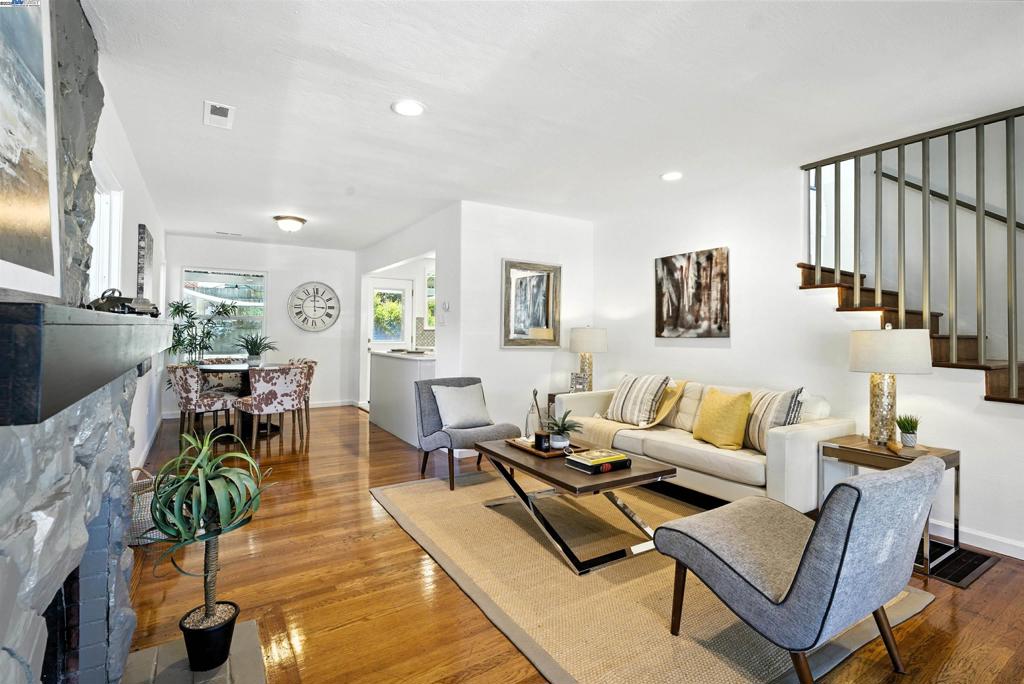 Welcome to Cozy Blue, a delightful split-level home nestled in the charming Eastmont Hills neighborhood! As you step inside, you’ll be greeted by an inviting open-concept living, dining, and kitchen area that seamlessly flows into a spacious grassy backyard, basking in warm southern sunlight. Upstairs, discover cozy bedrooms featuring beautiful hardwood floors, perfect for restful nights. Enjoy a tranquil atmosphere and breathtaking sunset views from the upper level. This home boasts an attached garage with direct access to the kitchen, along with a bonus laundry room for added convenience. The outdoor space is a true gem, showcasing a cement patio, barbecue setup, and ample room to create your dream garden. The expansive backyard is ideal for gatherings, while the fenced front yard provides extra privacy. Plus, you’ll appreciate the driveway and street parking right outside your door! With over $40,000 invested in recent renovations, this charming blue house truly shines! Located just minutes from the vibrant Laurel District and stunning King Estates hiking trails, you’ll enjoy easy freeway access and proximity to schools. Don’t miss your chance to make this wonderful home yours!