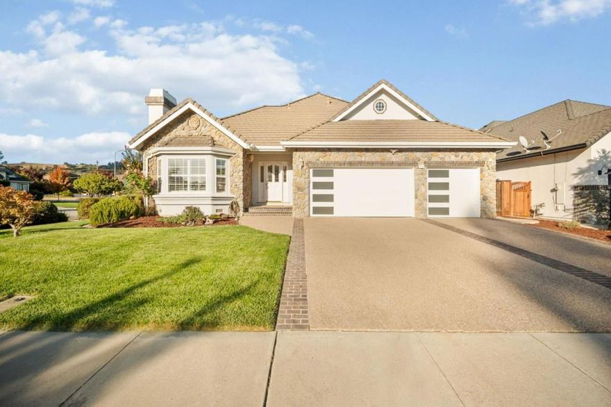 Welcome to this stunning single-story 4-bedroom, 2 ½-bathroom home in beautiful Morgan Hill. With 2,375 sq ft of living space on a generous 8,276 sq ft corner lot, this property offers both comfort and convenience.  The kitchen is a true highlight, featuring leathered granite countertops, a built-in induction cooktop, convection oven, microwave, and a trash compactorperfect for culinary enthusiasts. The living areas showcase beautiful hardwood and tile flooring, complemented by the warmth of a fireplace. Additional features include a built-in vacuum system, new water softener, plantation shutters, and skylights that fill the home with natural light. The spacious laundry area includes a 220V outlet and utility sink for added functionality. Outside, youll find a shed with power and water hookups and a backyard with lemon, plum, and persimmon treesa peaceful space to unwind or entertain. Located within the Morgan Hill Unified School District, this home also offers a three-car garage, central AC, a whole house fan, and forced-air heating, making it an ideal choice for comfortable, modern living.