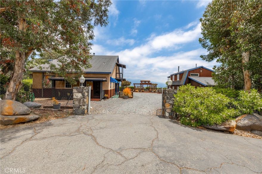 For Rent – $3,700/month (Utilities Included) Live on a maintained 5.86-acre estate in Rainbow featuring three homes in total. This offering is for the spacious 1,527 sq ft 2 bedroom, 2 bathroom residence with sweeping mountain and canyon views. Rent includes electricity and water. The home showcases hardwood floors, artistic woodwork, upgraded appliances, and bright, open living spaces. Tenant is responsible for maintaining their immediate area. Possible garage space and additional storage available, negotiable. Conveniently located near Fallbrook, Temecula, and I-15, this property offers both tranquility and accessibility. No pets