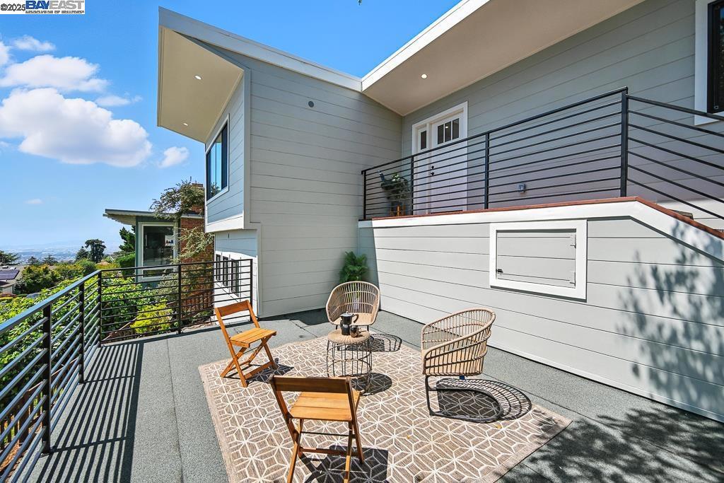 A Serene Retreat in the Berkeley Hills This splendid home is ideally situated above a tree-lined street in the Berkeley hills. It beautifully merges modern city living with the peacefulness of a charming neighborhood. Enjoy breathtaking bay views from the spacious front yard deck, which follows through to the open-concept living area. The incredible chef's kitchen features a gas range and an inviting eat-in dining space that leads to a secluded backyard. The large, exquisite backyard, adorned with trees and ivy offers ample room for entertaining, promoting a delightful indoor-outdoor lifestyle. The upper level includes two generous bedrooms, two fully remodeled bathrooms, and a laundry area. The lower level features a tranquil bedroom with an en suite bathroom. Throughout the home, you will find elegant plank flooring, beautifully tiled bathrooms, modern lighting, and custom paint that enhances the classic details. 411 Vassar provides convenient access to fantastic restaurants, coffee shops, parks, and UC Berkeley. Don’t miss this incredible opportunity to own a charming home in one of the city’s most sought-after locations!