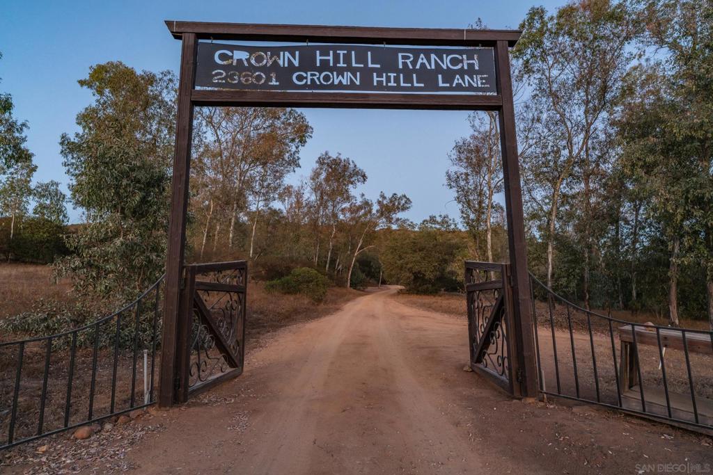 The possibilities abound at Crown Hill Ranch. Privacy, peace, and serenity envelop you with various wildlife and natural elements. On a clear day, you can see the Coronado Islands, San Clemente and all the way to Catalina Island. There is a building plan and pad already earmarked for a 4,800 sqft home. Currently there is a 1 br barn-kit home, a 1br tree house, and a 1 br office/guest house on the 77-acre parcel with well water, solar with battery backup, septic, and propane. A second home may be built on the 80-acre parcel along with additional ag buildings. *Two APNs: 240-070-11-00 (77 acres) and 240-150-07-00 (80 acres) The ranch has a quaint one-bedroom modern farmhouse. Lounge on the oversize wraparound porch, overlooking the historic 21,000 acre Rancho Guejito, the last privately owned Mexican land grant. The farmhouse has a wood-burning stove for those cool nights, and is equipped with a modern kitchen and bathroom. The upstairs loft bedroom has a clawfoot bathtub and views of rolling hills. Look out onto mature trees, including blue gum eucalyptus, lemon eucalyptus, coastal Live Oaks and the rare Engleman Oak. There are no endangered species or plants on the property. You might spot hummingbirds gathered around black button sage, or in the pollination garden. “Bee Hill” is a perch that has been used by beekeepers to develop a thriving honey yield. The ranch provides a safe home for mountain lions, golden eagles, mule deer, coyote, bobcat, quail, road runners, hawks, owls, and wild turkeys. The rich presence of wildlife gives you a true sense of being in the wild West.
