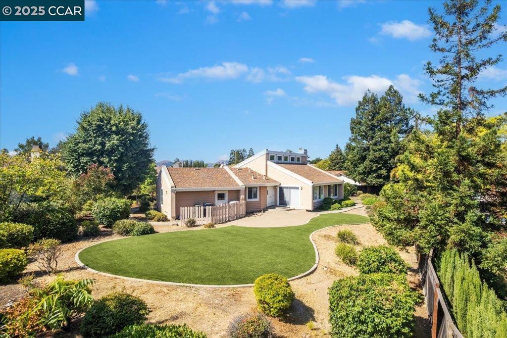 Serene & Stunning Home Located in South Livermore! Travel thru the Livermore wine vineyards & enter the exclusive-upscale Vista Del Arroyo neighborhood. The neighborhood consists of 32 Wine Country Estates - all elegant custom-built homes with the views of the hills and vineyards. This ranch-style has 3 bedroom, 2.5 bath, plus office, wet bar split between formal dining room and family room is 2874sqft with located on a 1/2 acre lot (20,023sqft). The soaring ceilings and open floor plan displays a mark of exquisite details and charm; courtyard patio sitting area; pantry & breakfast nook in the kitchen; large laundry room (inside home) with a sink & lots of cabinet storage (washer and dryer included in the sale as is the refrigertor); enjoy the large walk-in closet in the primary bedroom. Both front yard and backyard have drought-resistent landscaping with articifical grass in the backyard with a stone/brick patio for entertaining. This neighborhood also has several deers that visit and live in the neighborhood. Enjoy a short bike ride to town, walking distance to wineries in the heart of Livermore. Enjoy the sunrise across the valley, spectacular sunsets and warm nights by the fire while never leaving your own sanctuary. Virtual Tour: https://www.tourfactory.com/idxr3221284