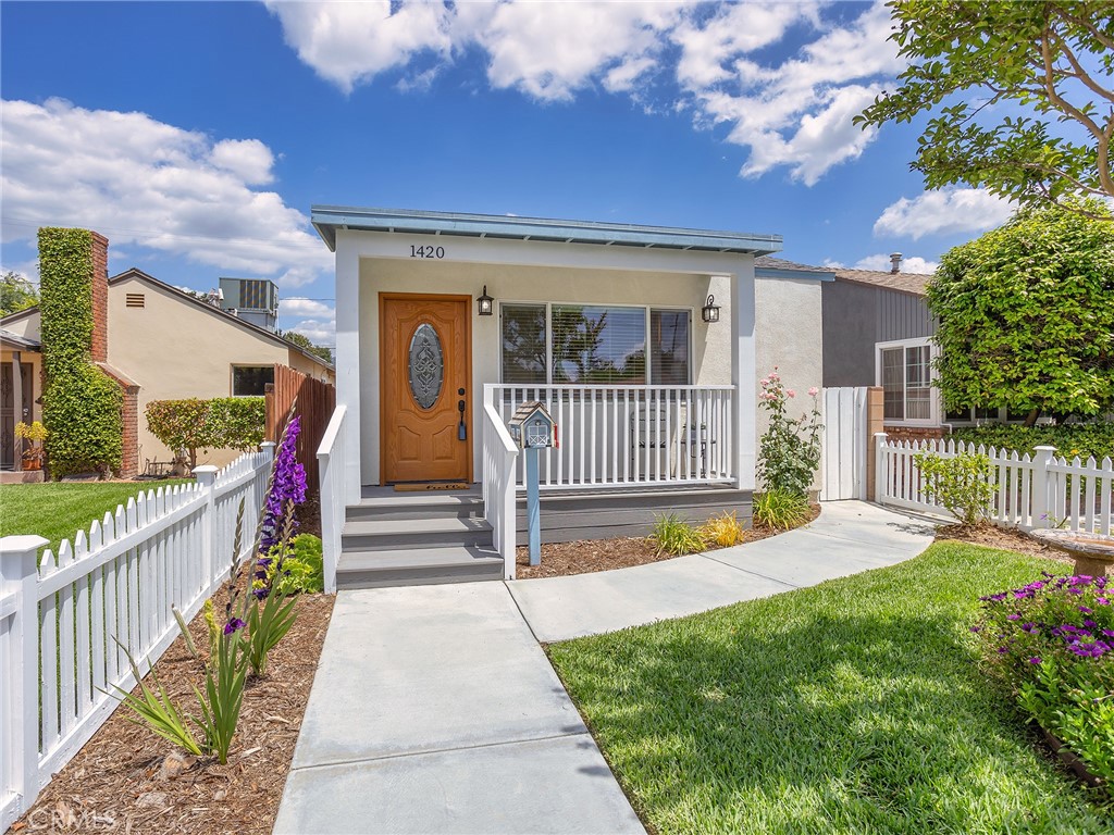 Welcome to this beautifully renovated gem, offering modern comforts and classic charm. Situated on a cozy 3,822 square food lot, this home features two bedrooms and one stunning bathroom. Over $300,000 has been thoughtfully invested in this transformation, with the entire house taken down to the studs and rebuilt to offer the highest quality finishes and craftsmanship. Every detail has been carefully considered, from the sleek new flooring and fresh walls to the stylish new kitchen and updated windows. The brand-new kitchen is the heart of the home, boasting all-new appliances, custom cabinetry, and a modern design perfect for both entertaining and quiet meals. Central heat and air ensure year-round comfort, and the home has been designed for maximum functionality in every season. The charming front porch, complete with a picturesque white picket fence, provides the perfect spot to relax and unwind, whether you're enjoying a morning coffee or watching the sunset. The detached two-car garage offers ample space for vehicles or extra storage, while a dedicated laundry room adds convenience and practicality to the home. This turnkey property blends style, functionality, and a touch of nostalgia, making it a true must-see. Don’t miss the chance to own this fully renovated beauty!