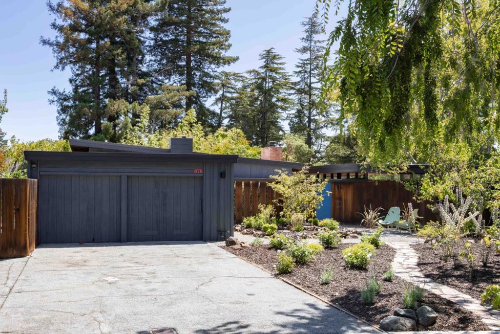 An exceptional opportunity awaits in a sought-after Palo Alto setting. Located on a rarely available lot of more than four-tenths of an acre, this mid-century modern home showcases hallmark features of the genre, including radiant heated floors, vaulted ceilings, redwood finishes, and bold walls of glass that invite the outdoors in. An open floor plan connects a spacious living room with fireplace to an updated kitchen outfitted with top-tier JennAir and Thermador appliances, while a sprawling backyard offers endless potential. Comfortable bedrooms include a generous primary suite, and the location is superb - just moments to Rinconada Park, minutes to downtown Palo Alto and Stanford, with access to top-rated schools including Walter Hays Elementary, Greene Middle, and Palo Alto High (buyer to verify eligibility).