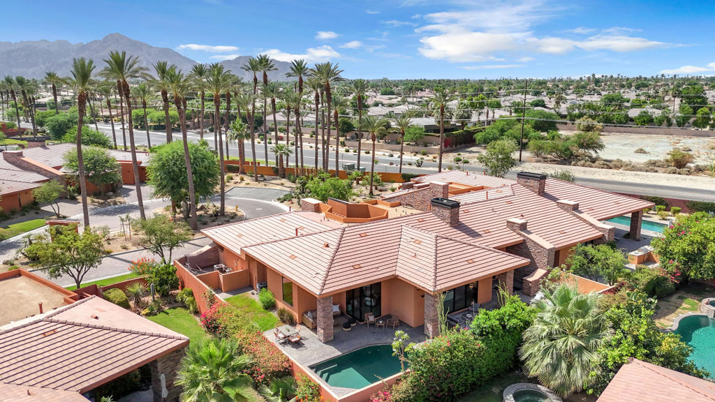 Step into the rare opportunity to own a brand-new‑feeling luxury retreat in Palmilla Country Club, one of La Quinta's most prestigious guard-gated communities. Nestled in the quiet and private cul-de-sac on Camino Privado, this fully updated single‑level estate feels like a model home, meticulously staged with fresh finishes and designer furnishings that showcase its sun drenched living spaces and breathtaking vistas.50050 Camino Privado offers 3 spacious bedrooms, 3.5 baths across ~2,894 sq ft, designed for both refined desert relaxation and low-effort entertaining. The dramatic, open concept layout features soaring ceilings, expansive windows, and a chef-grade kitchen, luxuriating evenings with fireplace glow or alfresco evenings beside the pool and spa, with the private entertainers backyard.The primary suite serves as a sanctuary, opening to a serene patio and spa retreat. The ensuite bath offers dual vanities, a walk-in shower, and a soaking tub designed to soothe and rejuvenate. Two additional bedroom suites are equally generous, offering flexibility for guests, office, or a personal gym.Climate conscious owners will appreciate Pebble‑tec pool and spa, central HVAC, and a turnkey maintenance plan via the $880/mo HOA, which includes landscaping, 24‑hour gated security, lake/canal maintenance, and citrus‑club privileges.This is a rare one-owner home, lovingly maintained since it was built and never rented. A full home inspection has already been completed with no issues noted, giving peace of mind to even the most discerning buyers. The property includes an attached casita with private entry and en-suite bath, perfect for hosting guests, caretakers, or creating a flexible work-from-home or income-producing space.Call today to set up private and discrete showing.
