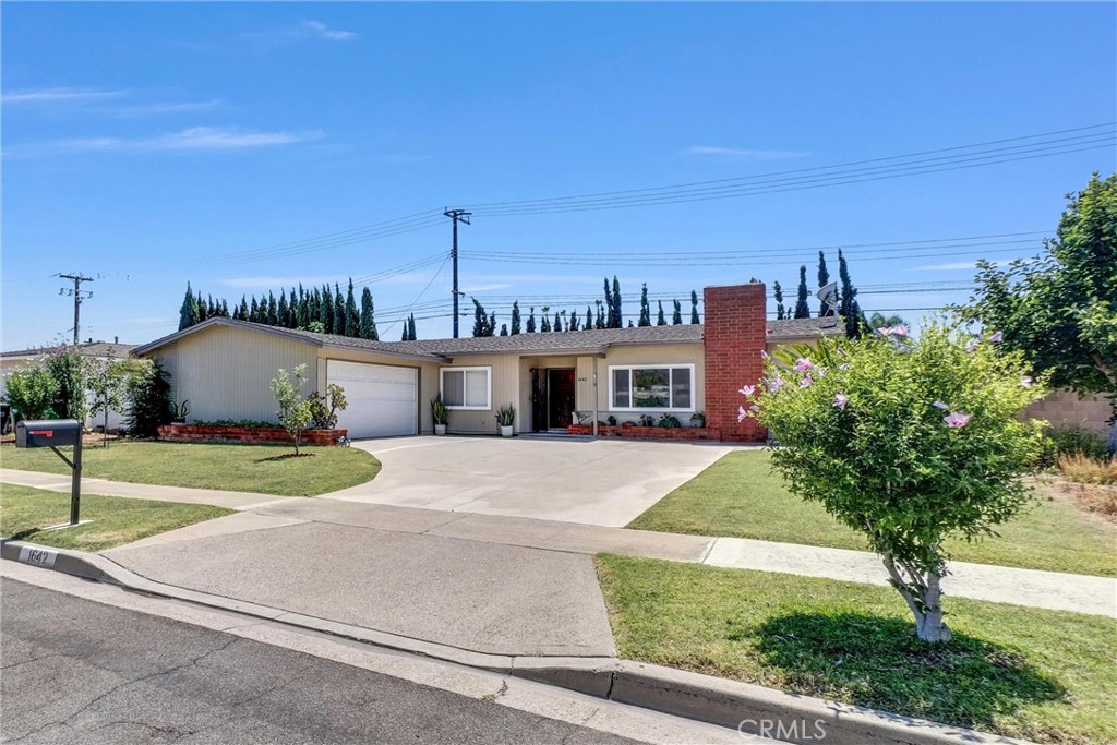 *UPDATED SINGLE LEVEL HOME* Welcome to this stunning single-level, 3 bedroom and 2 bathroom home in a HIGHLY DESIRABLE neighborhood in North Tustin. This beautifully updated residence offers modern comforts and stylish upgrades, perfect for today's buyers. Three generously-sized bedrooms, providing ample and comfortable space. The spacious front living room is bright with large windows that fill the area with natural light leading to an open dining area where you can hold countless gatherings! Newer finishings with more modern look, newer flooring, LED lights installed throughout the home, dual-pane windows and updated A/C! Step outside into your backyard and discover an expansive retreat with covered patio area and a large grassy lawn, ideal for outdoor entertaining or just relaxation. Enjoy fresh fruit from your own trees, including persimmons, pomegranate and apple trees. Plenty of parking with the extra-long driveway. No Hoa and No Mello Roos. Conveniently located near Irvine and the Tustin Marketplace and minutes away from shopping, dining, parks, and schools with convenient access to major freeways. This home blends modern upgrades with charm, offering a fantastic opportunity to create your perfect living space. Don’t miss this opportunity to call this home yours - schedule a tour today and bring all offers!
