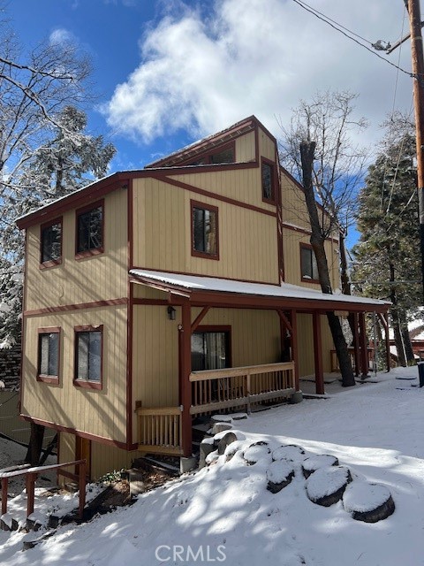 Price Reduction! Spacious and Elegant abounds in the Architecturally Spectacular Cabin built by one of the most sought-after builders in Green Valley Lake. this 2 bedroom 2 bath home is extraordinary with an open floor plan with a level entry. Master bedroom offers Anne-suite and access to a private deck. Kitchen offers wood countertops along with a matching center island and dining area. Owners have spared no expense in decorating this cabin. Living room offers an open floor plan that leads out to a private deck, great for entertaining! with natural rock fireplace for those snowy winter nights inGreen Valley Lake. T&G along with cathedral ceilings through out cabin along with a loft the kids would enjoy! bathrooms have been updated with wood countertops and updated fixtures. New furnace and water heater and a Kohler whole house generator. Basement has potential for adding a bedroom or game room with a 3rd bathroom.