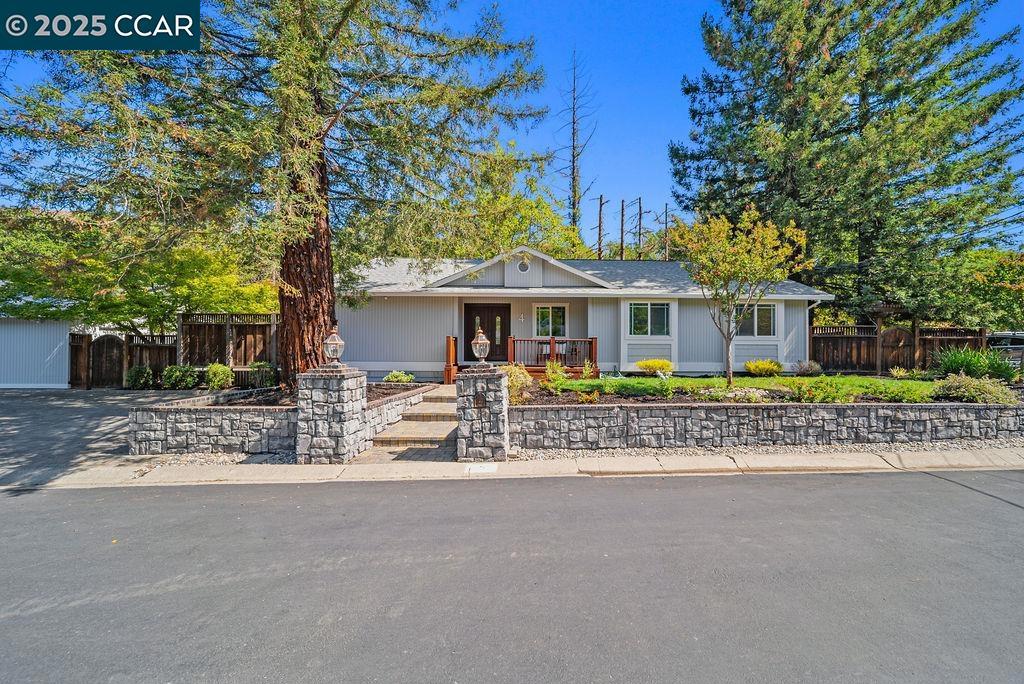 Amazing, recently updated home! Featuring 3 bedrooms, 2 baths, an office, and a cozy reading room. The backyard has been refreshed with decks designed for entertaining or unwinding, while the generous side yard is a blank canvas ready for your creativity—ADU, pool, play area, batting cage, pickleball court, let your imagination run wild. The garage has a Tesla Solar Roof with two Tesla powerwalls and an EV charger. Tucked away on a private road with neighborhood charm, this home is ready for you to move in and make it your own.