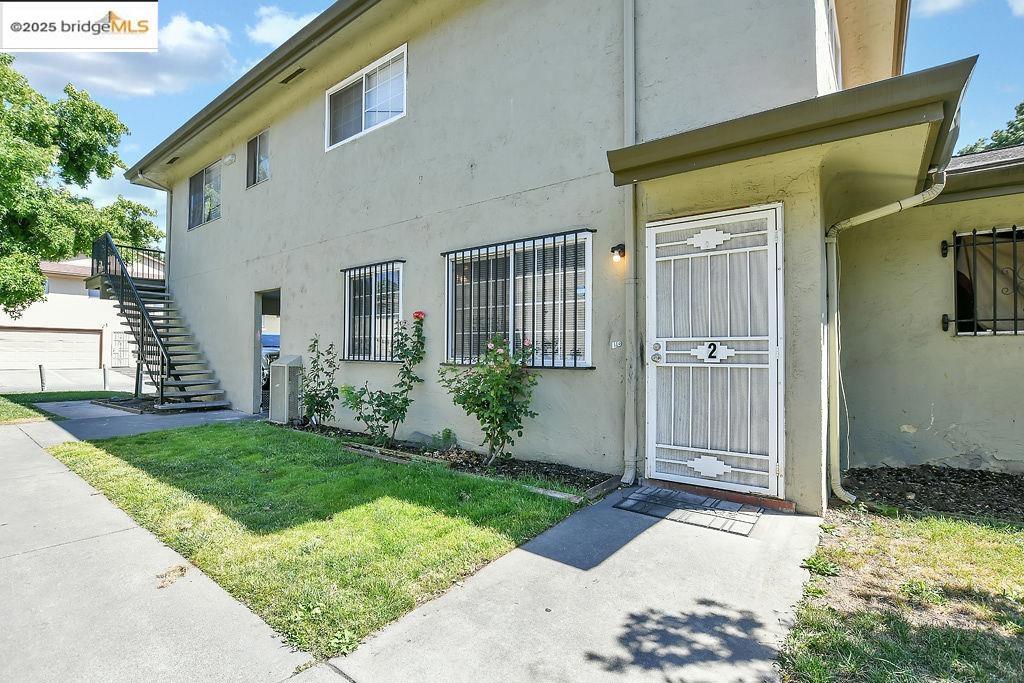 This is a fabulous opportunity for investors or first time home-buyer. This 2 bedroom 1 bath condo with central heat/air offers newer dual pane windows, laminate flooring, granite counters, white appliances, blinds, and ceiling fan downstairs. The upstairs features a primary bedroom with walk-in closet, additional bedroom, remodeled bathroom, newer carpet, and hall closet. There is a storage locker in the garage to the left of the carport along with a laundry facility at the back of the building that is shared by the 4-plex. Contra Loma Estates HOA includes landscape, water, garbage, community pool, and a community center. Area is close to public transportation, schools, easy access to the Antioch BART extension, Highway 4, fairgrounds, walking trails, hiking, boating, fishing, and shopping. This is the most popular floorplan at the best price currently. This price and rental opportunities offer a good CAP rate for investors.