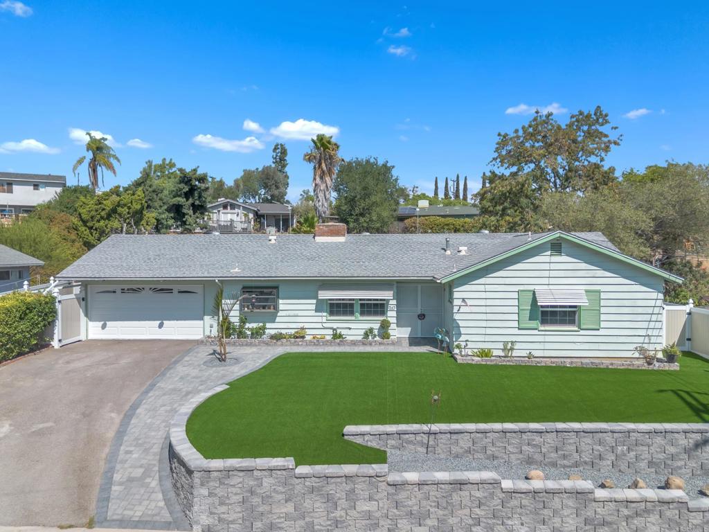 Welcome to 1545 Meadow Rd, El Cajon, CA 92021. Step inside to gorgeous tile flooring throughout and fresh interior paint, complemented by classic kitchen cabinets (installed in 2021) and a newer stove. The home features updated electrical wiring with LED lighting throughout, six LED chandeliers with fans and remote controls, an Energy Star whole-house fan, auto shut-off bathroom vent fans and heaters, newer windows, a newer AC system, a newer boiler, and updated attic insulation. Step outside to your beautiful backyard with a low-maintenance, gas-heated pool, solar lights with auto dusk-to-dawn sensors, four storage sheds, and established grape, lemon, and mandarin fruit trees—plus plenty of space to plant your own fruits and vegetables. The front yard is fully landscaped with artificial grass, a new retaining wall, and a paver walkway. There are also new fences with key-lock gates. The fully remodeled 2-car garage includes attic storage with pull-down stairs and a new insulated door with a quiet side-mount motor. The large backyard offers great potential for expansion or an ADU. This home is move-in ready and waiting for you to make it your own!