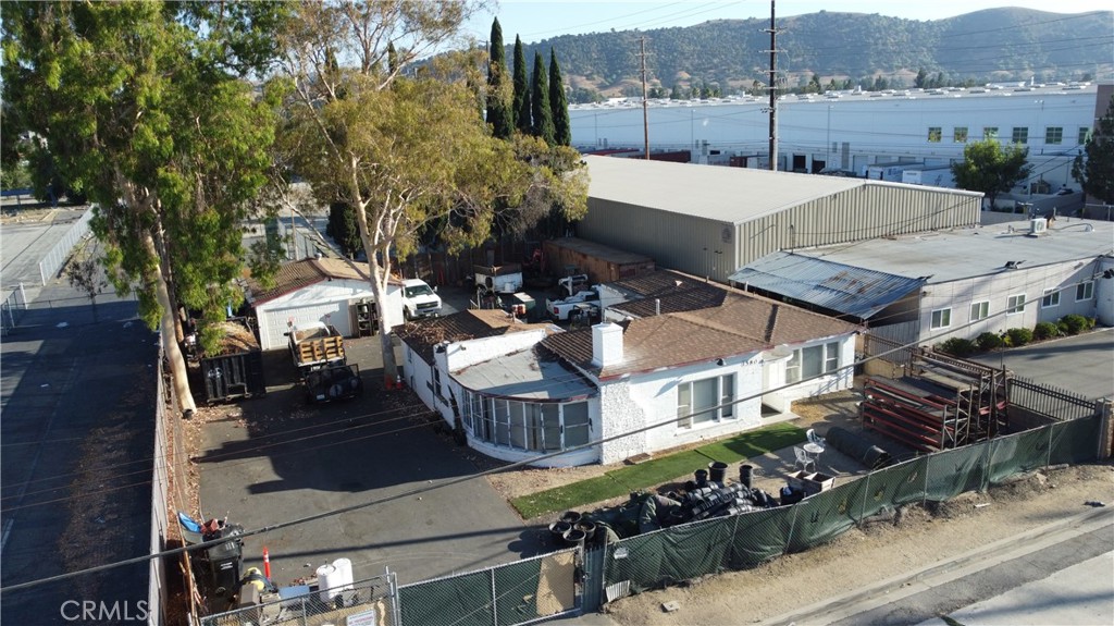Now available in the heart of Pomona, this versatile contractor yard is ideal for owner-users or investors seeking a property with built-in functionality for trade operations. Situated on a generous 12,004 SF lot, this 1,782 SF structure was originally built in 1946 and currently serves as an owner-user office with paved and fenced yard space. The property features an oversized 2-car garage, paved and fenced yard, and ample room for truck and equipment parking. Located near the 71, 60, and 10 freeways, the site offers excellent access for logistics, crews, and deliveries.