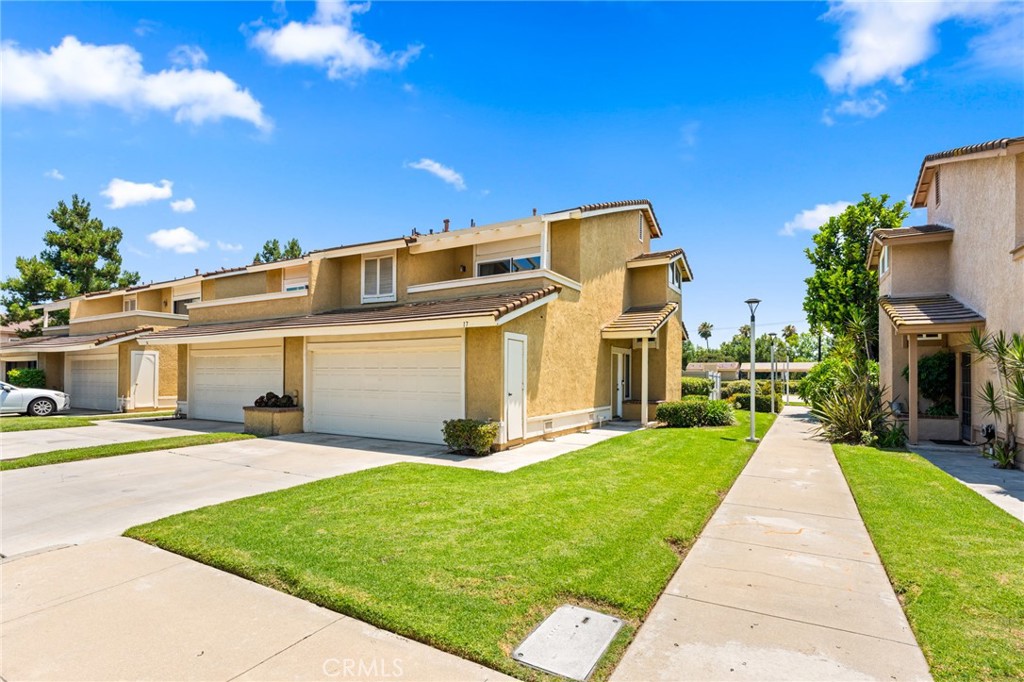 LOCATION! LOCATION! LOCATION! This move-in-ready 2-bed, 2.5-bath home offers 1,534 sq ft of beautifully updated living space in a prime Chino location—just minutes from Costco, Sam’s Club, Walmart, 99 Ranch, H Mart, Spectrum Towne Center, The Shoppes, and quick access to the 60 & 71 freeways. Renovated in 2021, it features two spacious primary suites with walk-in closets and modern en-suite bathrooms. The upgraded kitchen boasts new cabinetry, quartz countertops, a new stove, upgraded dishwasher, and a sleek designer range hood. The open living and dining area leads to a private patio—ideal for entertaining or relaxing. Additional highlights include new flooring throughout, an indoor laundry area, direct-access 2-car garage, and updated lighting and fixtures. Community amenities include a sparkling pool, spa, and basketball court. A rare opportunity to own a stylish, move-in-ready property in one of Chino’s most convenient and desirable neighborhoods!