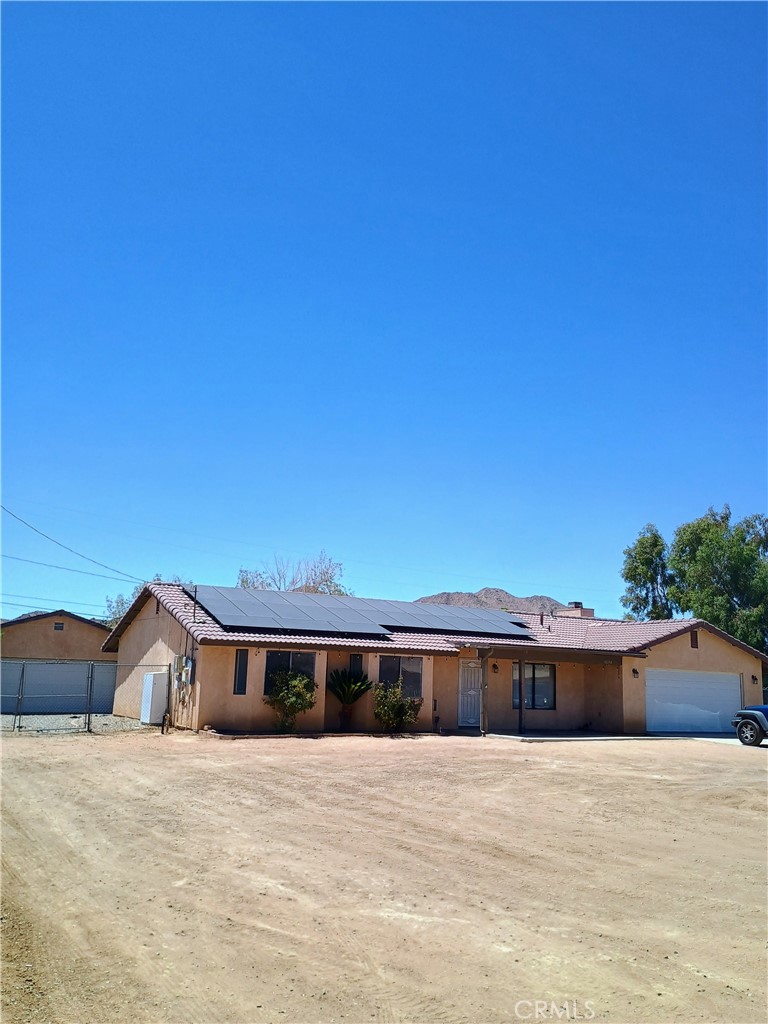 * 3 BEDS * 2 BATHS * 1/2 ACRE LOT * FIREPLACE * OPEN FLOOR PLAN * TANKLESS WATER HEATER * NICE AREA * 2 CAR GARAGE * ALSO A SEPERATE DETACHED 2 CAR GARAGE * TILE ROOF * SOLAR SYSTEM * RV PARKING * CAMERAS * WOOD FLOORS * TILE COUNTERTOPS * CEILING FANS * MIRROR CLOSET DOORS * FULLY FENCED ^ COVERED PATIO * CLOSE TO SHOPPING AND FWY * HURRY WONT LAST