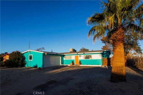 Photo of 5931 Rose Ellen Avenue, 29 Palms, CA 92277 (MLS # JT26039512)