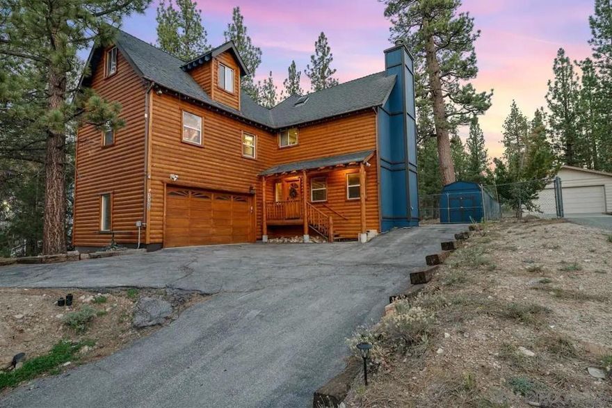 $5,000 Seller Credit to Buyer!  This spacious 2,537 sq. ft. Big Bear home offers 4 bedrooms, 3.5 bathrooms, and a bonus room, making it ideal for hosting family and friends. Beautifully updated throughout, the home features:  Modern kitchen with brand-new high-end appliances  Game room plus both a fireplace and a wood-burning stove  Spa-inspired master suite with jetted tub, walk-in shower, pebble stone flooring, and private deck access  EV charger, finished attic, hot tub, and RV parking that extends into the backyard  Expansive fenced yard with mature pines, BBQ deck, dog run, and plenty of space to relax outdoors  Included in the sale are $50,000+ worth of furnishings, making this a turn-key opportunity for a mountain retreat, vacation home, or primary residence.